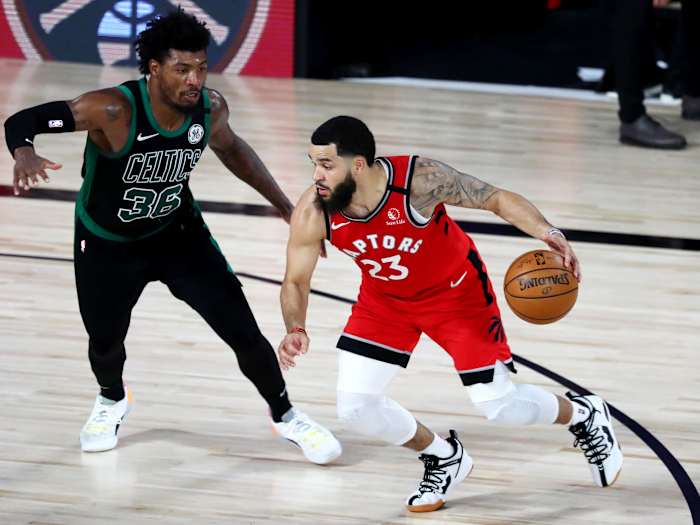 Sep 7, 2020; Lake Buena Vista, Florida, USA; Toronto Raptors guard Fred VanVleet (23) dribbles the ball against Boston Celtics guard Marcus Smart (36) during the second half of game five of the second round in the 2020 NBA Playoffs at ESPN Wide World of Sports Complex.